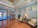 Inviting lobby with hardwood floors, a cozy seating area, and a well-stocked bookshelf for community enjoyment at 2011 N Hwy 17 # 2200H, Mount Pleasant, SC 29466