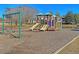 Community playground area with slides, swings, and climbing structures, next to a pond at 2011 N Hwy 17 # 2200H, Mount Pleasant, SC 29466