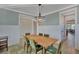 View of a dining room with chandelier, hardwood floor and seating for six at 2038 Sea Water Dr, James Island, SC 29412