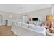 Spacious living room with a cozy white sofa, stylish decor, and great natural light at 2038 Sea Water Dr, James Island, SC 29412
