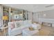 Comfortable living area with built-in bookshelves and a spacious sectional, perfect for relaxation at 2038 Sea Water Dr, James Island, SC 29412