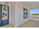 Spacious porch with railing, wood decking, and an exterior entry door at 2038 Sea Water Dr, James Island, SC 29412