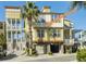 Charming multi-story home showcasing a well-maintained exterior with a garage and lush landscaping at 204 Michigan Ave # C-5 - 11, Folly Beach, SC 29439