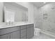 Modern bathroom featuring a double sink vanity and a tiled walk-in shower at 205 Somerset Acres Dr, Summerville, SC 29486