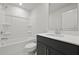Contemporary bathroom features a sleek vanity with white marble countertop and a bathtub with a shower at 205 Somerset Acres Dr, Summerville, SC 29486