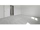 Bedroom with plush gray carpet, a door, and access to a walk in closet at 205 Somerset Acres Dr, Summerville, SC 29486