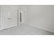 Bedroom with plush gray carpet and double door closet and access to an ensuite at 205 Somerset Acres Dr, Summerville, SC 29486