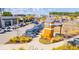 Parking at neighborhood retail shops with well-maintained landscaping at 205 Somerset Acres Dr, Summerville, SC 29486