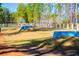Community dog park with play equipment and fencing providing a secure place for dogs to exercise and socialize at 205 Somerset Acres Dr, Summerville, SC 29486