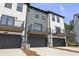 Charming townhomes with balconies and garage, showcasing modern exteriors and welcoming curb appeal at 205 Somerset Acres Dr, Summerville, SC 29486