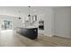 Contemporary kitchen with stainless appliances, a center island and sliding glass doors at 205 Somerset Acres Dr, Summerville, SC 29486