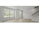 Living room featuring many windows and a staircase at 205 Somerset Acres Dr, Summerville, SC 29486