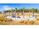 Community playground featuring vibrant seating, picnic tables, and play structures, creating a joyful gathering place for residents at 205 Somerset Acres Dr, Summerville, SC 29486