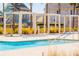 Modern community pool and lounge area with stylish pergola and lush landscaping at 205 Somerset Acres Dr, Summerville, SC 29486