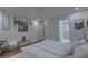Bright and spacious bedroom features a cozy bed, modern furnishings, and access to an attached bathroom at 205 Towhee Dr, Summerville, SC 29485