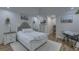 Inviting bedroom featuring a plush bed, stylish decor, and ample natural light from strategically placed lighting at 205 Towhee Dr, Summerville, SC 29485