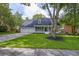 Charming home featuring a lush lawn, inviting front porch and a two-car garage enhancing its curb appeal at 205 Towhee Dr, Summerville, SC 29485