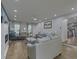 Bright living room with white furniture, a ceiling fan, and lots of natural light with hardwood flooring at 205 Towhee Dr, Summerville, SC 29485