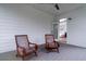 Back porch featuring hardwood floors and wooden chairs with a view into the bedroom at 2408 Bent Oak Rd, Mount Pleasant, SC 29466