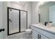 Modern bathroom featuring a glass-enclosed shower, white vanity, and contemporary fixtures at 2408 Bent Oak Rd, Mount Pleasant, SC 29466