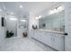 Spacious bathroom with marble floors, a walk-in shower, and double vanity sinks at 2408 Bent Oak Rd, Mount Pleasant, SC 29466