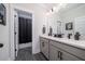 Modern bathroom with double sink vanity, black hardware, and shower at 2408 Bent Oak Rd, Mount Pleasant, SC 29466