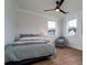 Charming bedroom features neutral decor, wood floors and natural light at 2408 Bent Oak Rd, Mount Pleasant, SC 29466