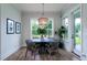 Dining room with a stylish light fixture, table, chairs, and natural light at 2408 Bent Oak Rd, Mount Pleasant, SC 29466