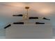 Modern black and gold light fixture at 2408 Bent Oak Rd, Mount Pleasant, SC 29466