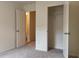 Comfortable bedroom with an open closet, plush carpet, and easy access to other living spaces at 2502 Scarlett Maple St, Summerville, SC 29486