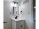 Updated bathroom vanity with modern lighting, fixtures, and bright, neutral colors at 2657 Oregon Ave, North Charleston, SC 29405