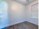 Bedroom with wood-look flooring and a bright window to let in natural light at 2657 Oregon Ave, North Charleston, SC 29405
