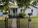 A cozy home is fenced in, with a covered front porch and a 'no trespassing' sign at 2749 E Surrey Dr, North Charleston, SC 29405