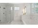 Elegant bathroom with a glass shower, soaking tub, and modern fixtures at 2828 Wagner Way, Mount Pleasant, SC 29466