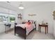 Charming bedroom with bright windows, a comfy bed, and personalized details at 2828 Wagner Way, Mount Pleasant, SC 29466