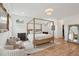 Spacious bedroom features hardwood floors, a four-poster bed, and natural lighting at 2828 Wagner Way, Mount Pleasant, SC 29466