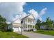 Beautiful two-story home with a two-car garage and an inviting front porch at 2828 Wagner Way, Mount Pleasant, SC 29466