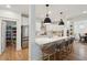 Open concept kitchen with stainless steel appliances, quartz counters, and large island with seating at 2828 Wagner Way, Mount Pleasant, SC 29466