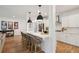 Open concept kitchen with stainless steel appliances, quartz counters, and large island with seating at 2828 Wagner Way, Mount Pleasant, SC 29466