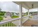Exterior porch with white railings overlooking the quiet neighborhood street at 2828 Wagner Way, Mount Pleasant, SC 29466