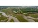 Panoramic aerial view showcases marsh views and neighborhood homes with boat access at 2834 Parkers Landing Rd, Mount Pleasant, SC 29466
