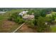 Aerial view of beautiful home with a private walkway to the marsh, serene surroundings, and picturesque neighborhood at 2834 Parkers Landing Rd, Mount Pleasant, SC 29466
