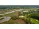 Scenic aerial shot showcases waterway views, golf course access, and a private dock at 2834 Parkers Landing Rd, Mount Pleasant, SC 29466