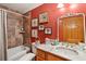 Bathroom with tub, shower, granite counter, and framed mirror at 2834 Parkers Landing Rd, Mount Pleasant, SC 29466