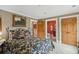 Comfortable bedroom with floral bedspread, neutral walls, and adjoining bathroom at 2834 Parkers Landing Rd, Mount Pleasant, SC 29466