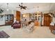 Open bedroom with seating, overhead fan, and built-in cabinets at 2834 Parkers Landing Rd, Mount Pleasant, SC 29466