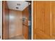 Elevator with wood paneling, telephone, overhead lighting, and a tile floor at 2834 Parkers Landing Rd, Mount Pleasant, SC 29466