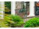 Inviting front porch with brick flooring, iron railings, and decorative plants adds charm at 2834 Parkers Landing Rd, Mount Pleasant, SC 29466
