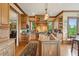 Gourmet kitchen with custom wood cabinets, granite countertops, stainless steel appliances, and a kitchen island at 2834 Parkers Landing Rd, Mount Pleasant, SC 29466