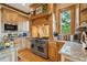A well-appointed kitchen featuring stainless steel appliances, custom cabinetry, and granite countertops at 2834 Parkers Landing Rd, Mount Pleasant, SC 29466